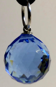 Blue Crystal Ball On A Black Cord