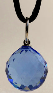 Blue Crystal Ball On A Black Cord